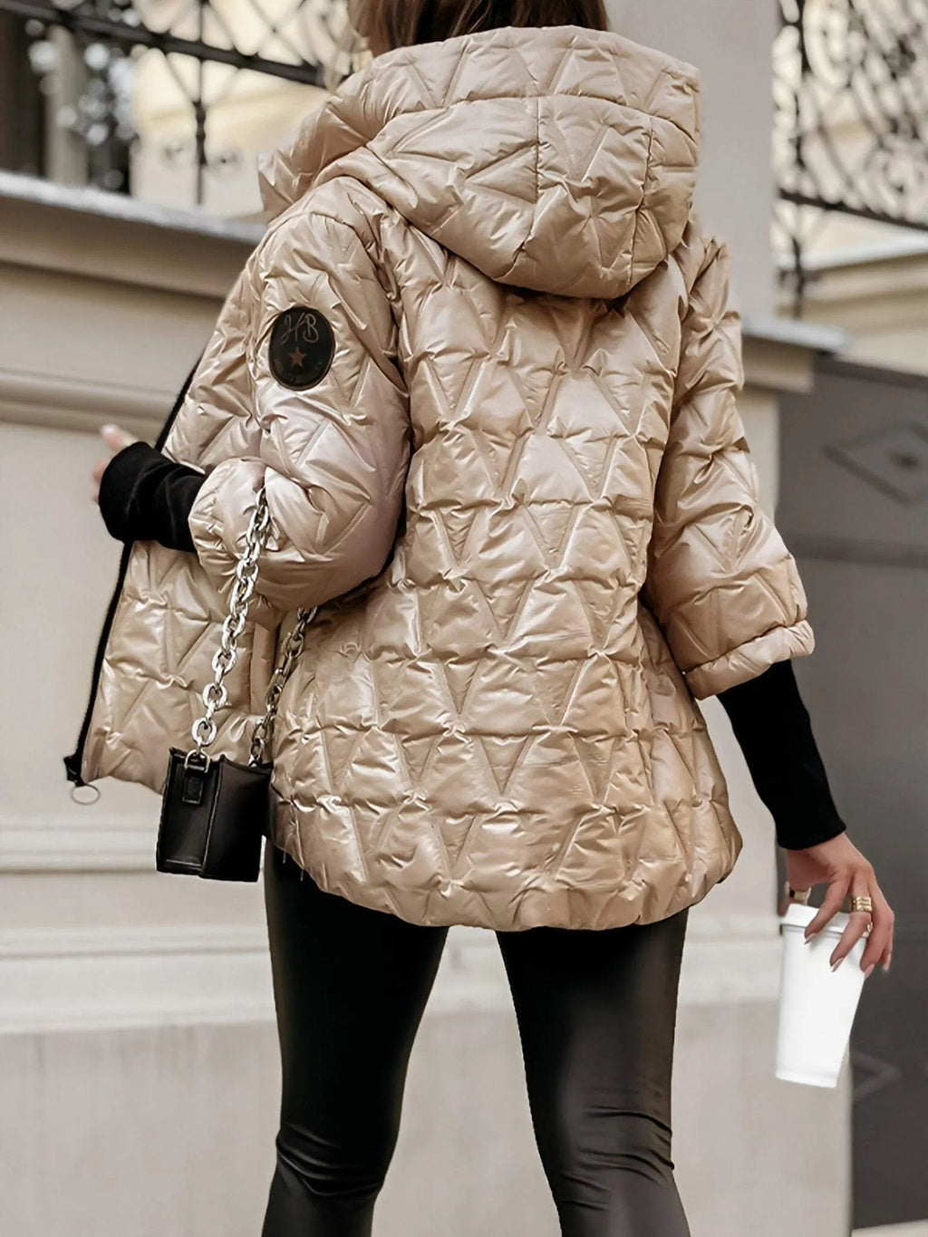Eline | Chaqueta acolchada brillante con capucha