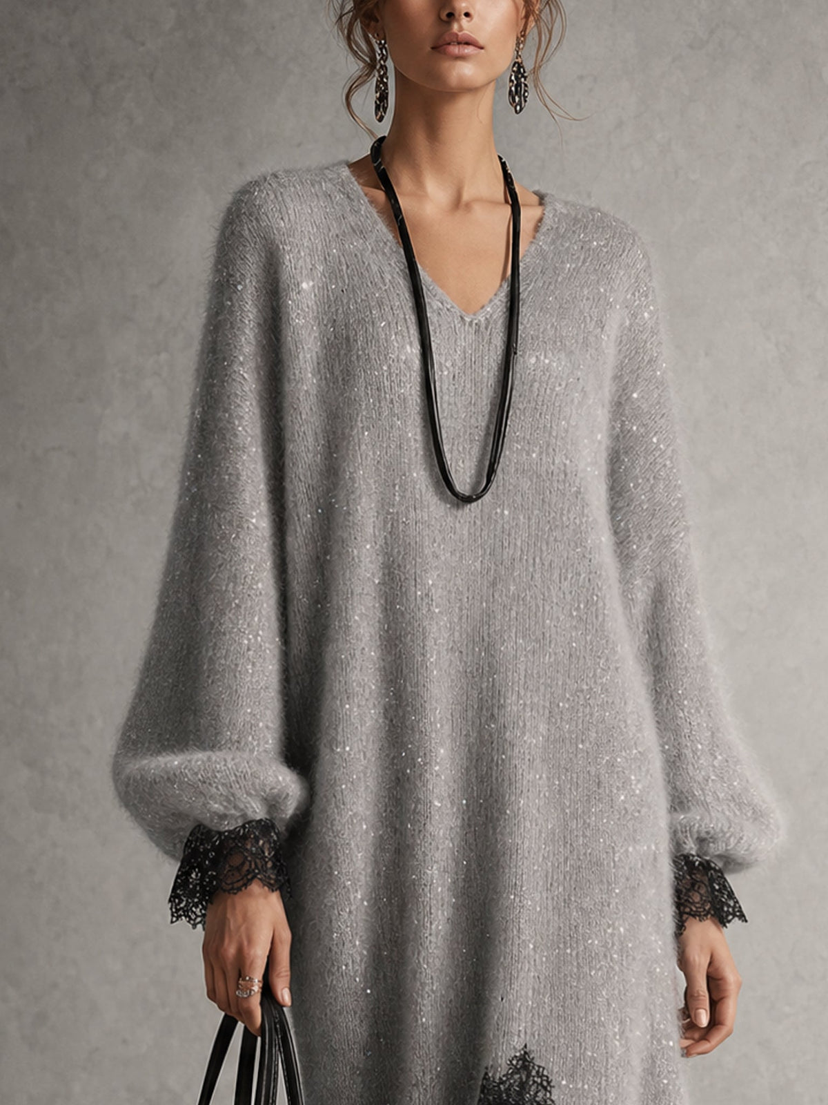 Vestido midi gris de punto brillante con bajo de encaje