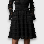 Parisa – Vestido midi con flecos transparentes