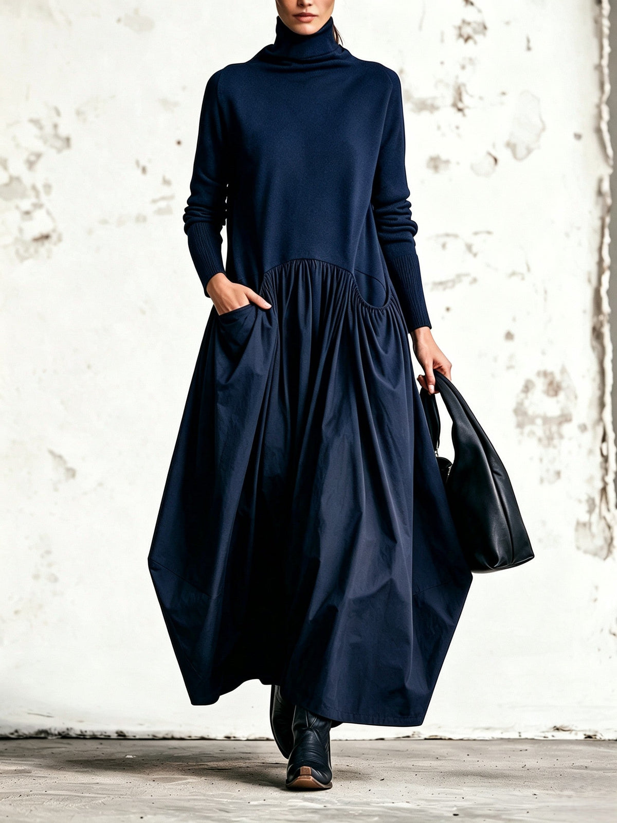 Vestido largo negro oversize con cuello alto y bolsillos
