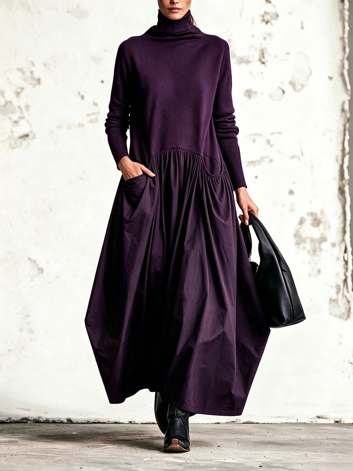 Vestido largo negro oversize con cuello alto y bolsillos