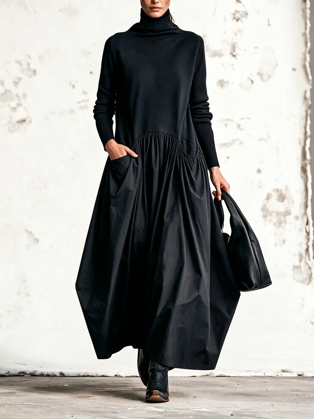 Vestido largo negro oversize con cuello alto y bolsillos