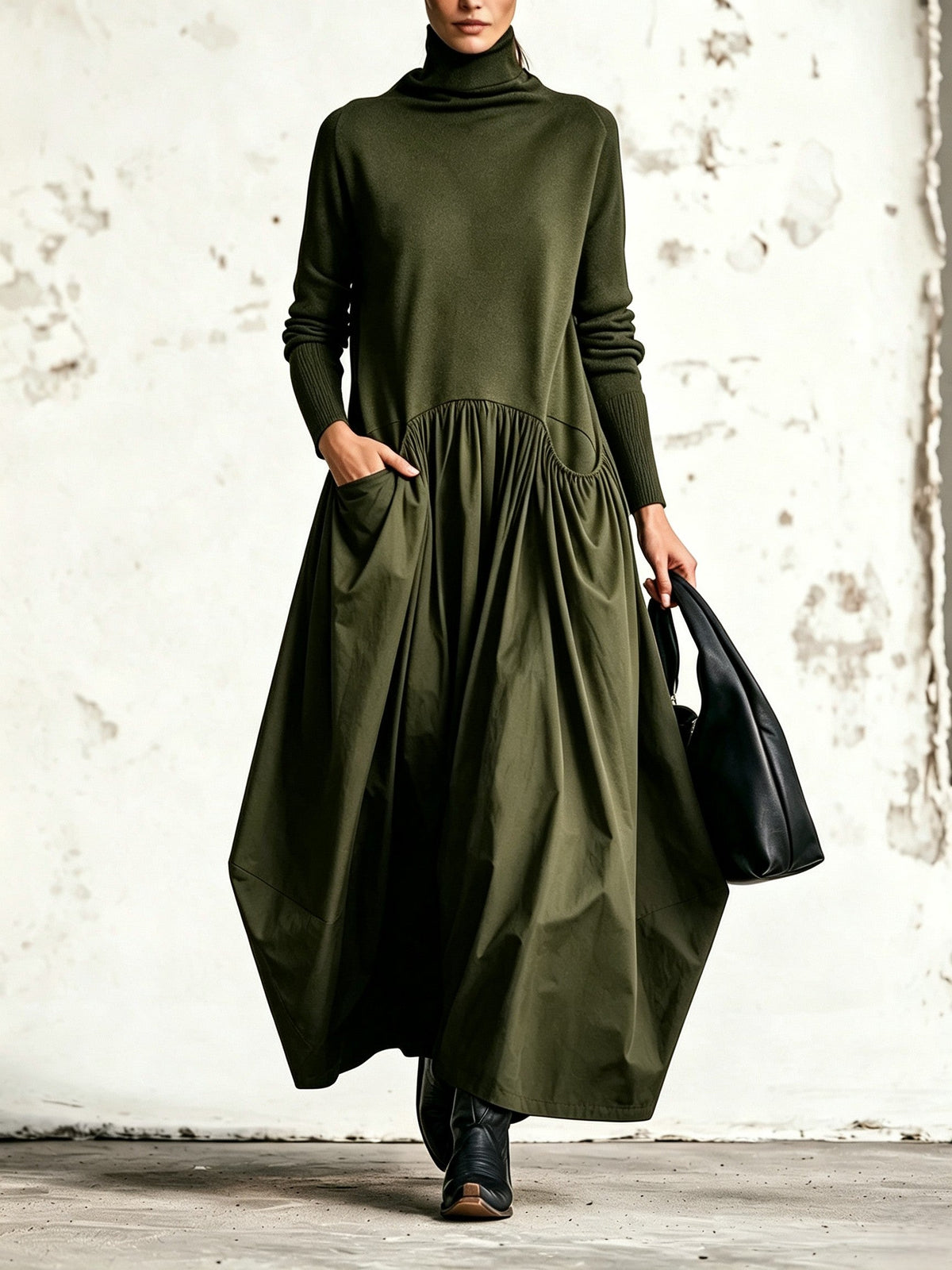 Vestido largo negro oversize con cuello alto y bolsillos