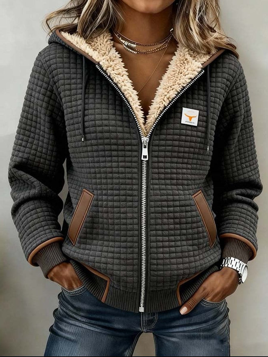 Sandra | Chaqueta acolchada con forro Sherpa, capucha y cremallera