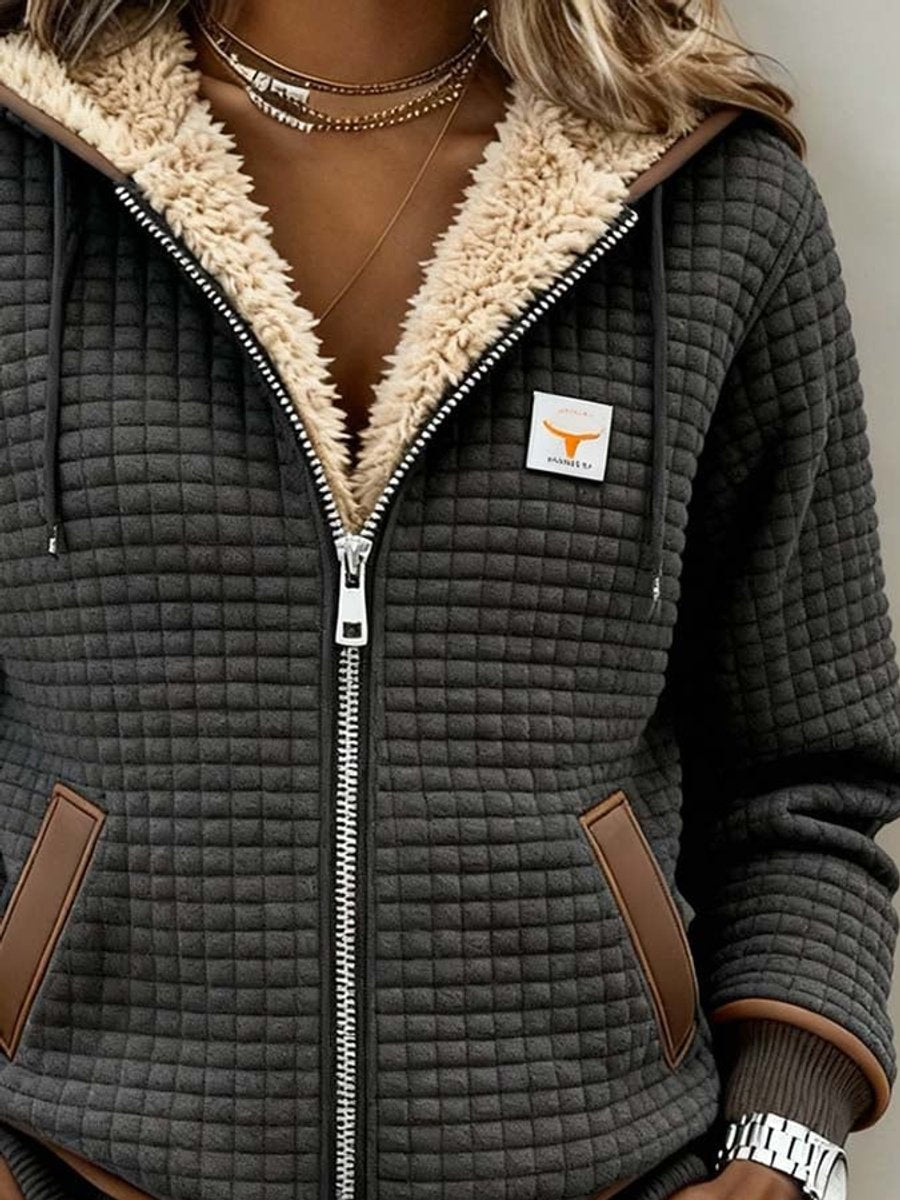 Sandra | Chaqueta acolchada con forro Sherpa, capucha y cremallera