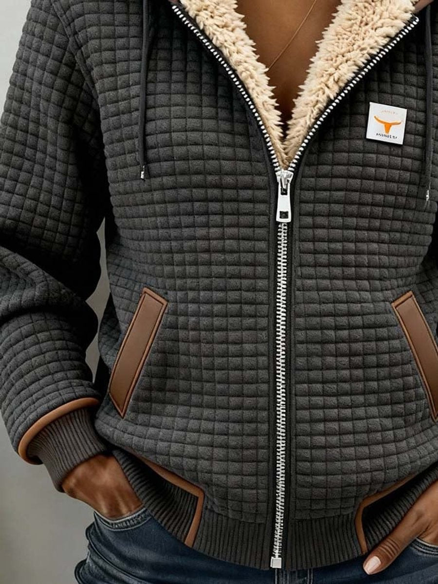 Sandra | Chaqueta acolchada con forro Sherpa, capucha y cremallera